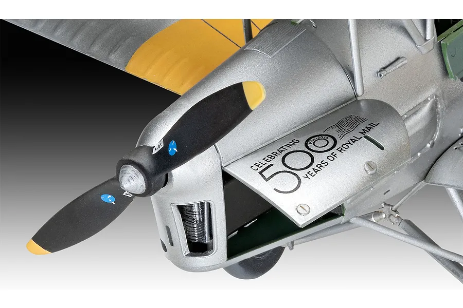 Close-up of a Revell 1/32 scale D.H. 82A Tiger Moth model aircraft showing the nose, propeller, and Royal Mail 500th anniversary decal.