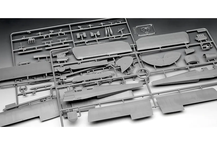 Grey plastic model kit sprue containing various aircraft parts for a D.H. 82A Tiger Moth model.