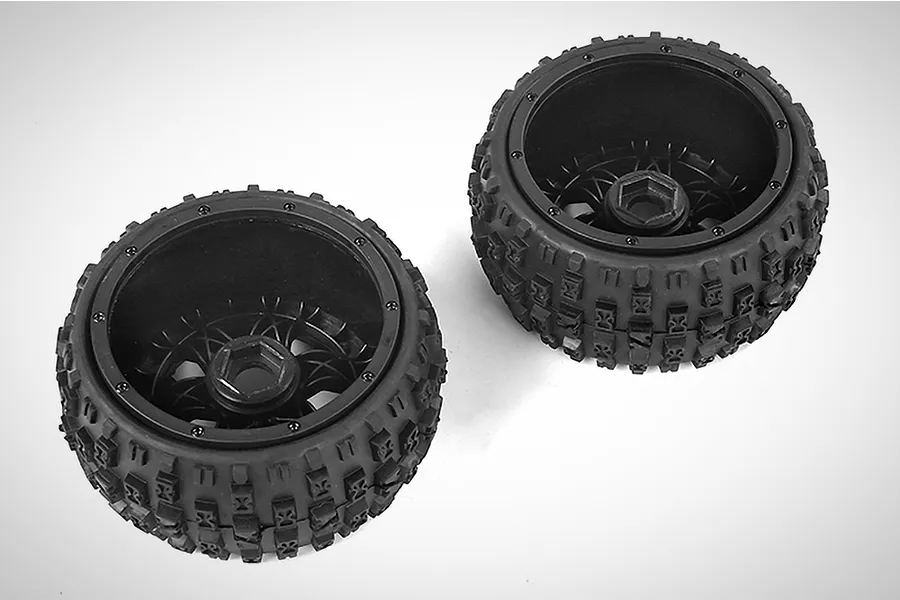Two Rovan Baja 5B rear wheels with black rims and Wasteland off-road tyres, featuring a beadlock design and hexagonal wheel hubs.
