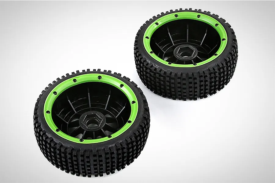 Two Rovan V5 Dirt Buster RC buggy wheels with black knobby tires and bright green beadlock rims on a white background.
