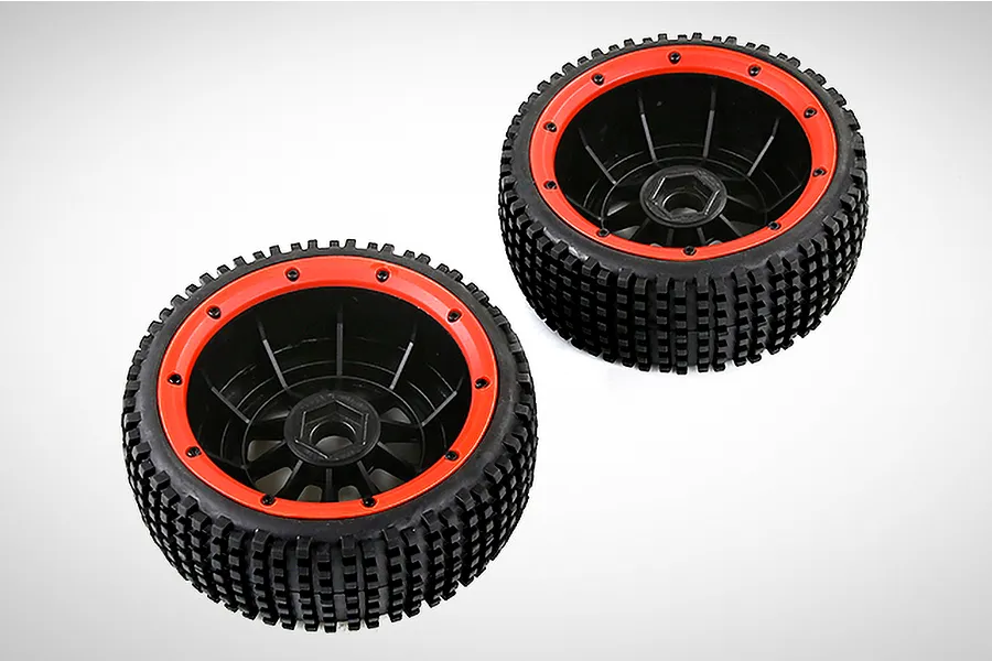 Two Rovan RC buggy wheels with black knobby tires and red beadlock rims against a white background.