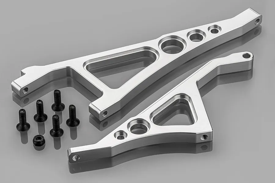 Rovan 5IVE-T silver aluminium front and rear chassis brace set with included black mounting screws on a grey background.