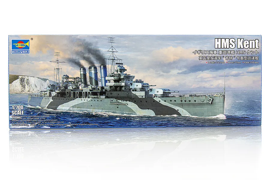 Trumpeter 1/700 scale HMS Kent plastic model kit box art showing a painted illustration of the warship at sea.