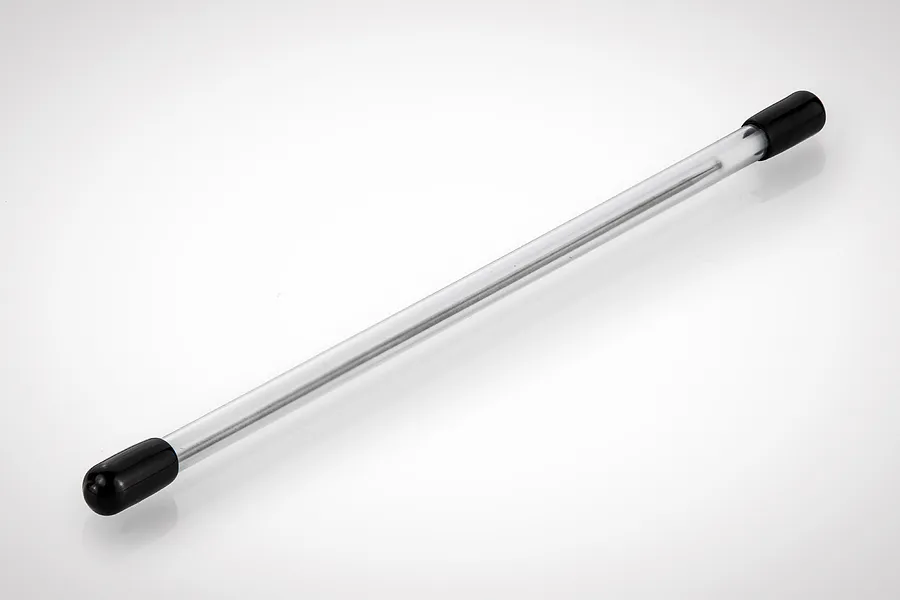A thin metal airbrush needle enclosed in a clear protective plastic tube with black end caps, isolated on a white background.
