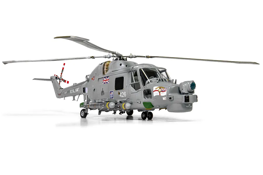 A fully assembled and painted 1/48 scale plastic model of a Royal Navy Westland Lynx helicopter, shown against a plain white background.