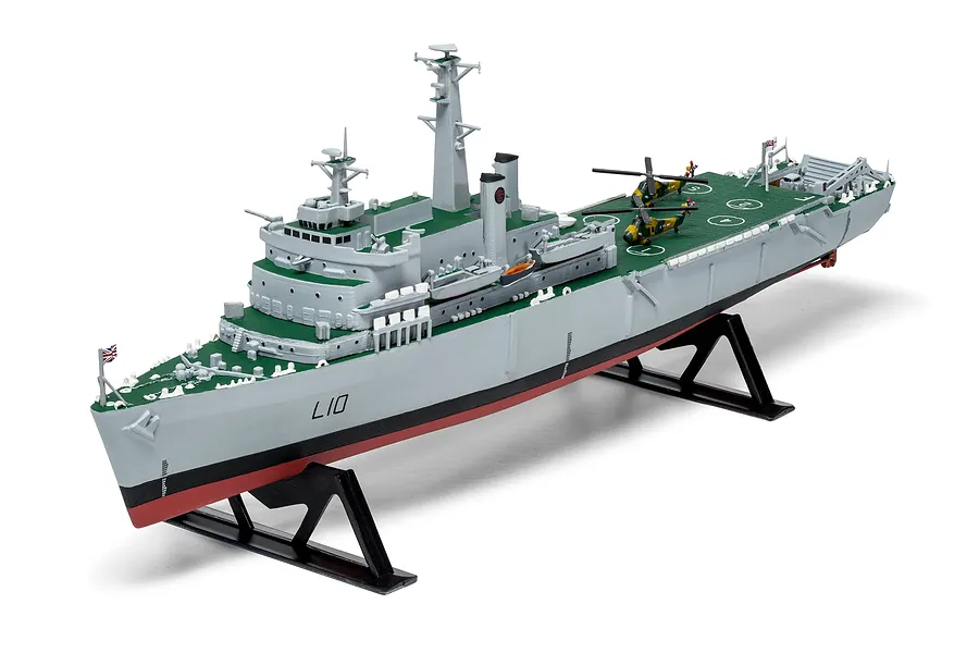 A fully assembled and painted 1/600 scale plastic model of the HMS Fearless assault ship, mounted on a black display stand against a white background.
