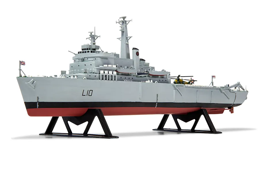 A fully assembled and painted 1/600 scale plastic model of the HMS Fearless ship, mounted on two black display stands against a white background.