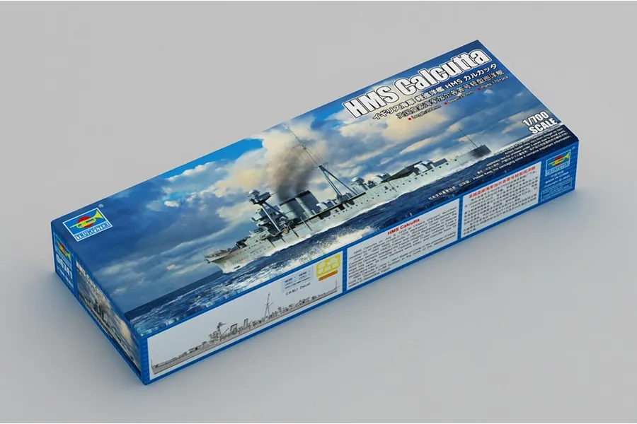 A 1/700 scale Trumpeter HMS Calcutta light cruiser plastic model kit box, showing an illustration of the ship at sea on a blue background.