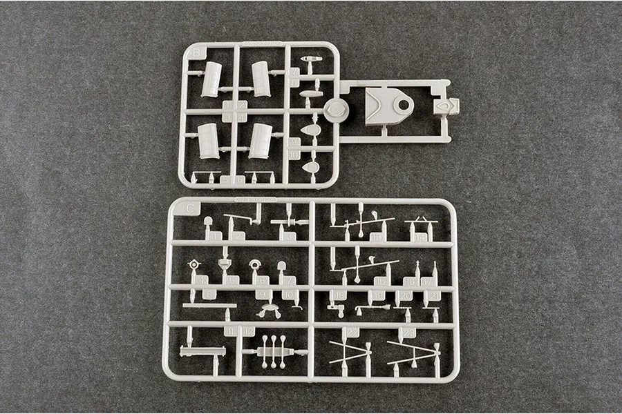 Two grey plastic model kit sprues labeled B and C containing various small ship parts for a 1/700 scale model.