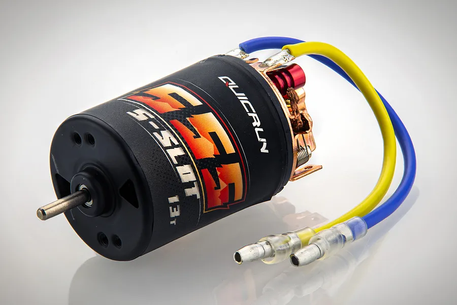 Hobbywing Quicrun 555 13T brushed RC motor with black casing, red end bell details, and blue and yellow wires with bullet connectors.