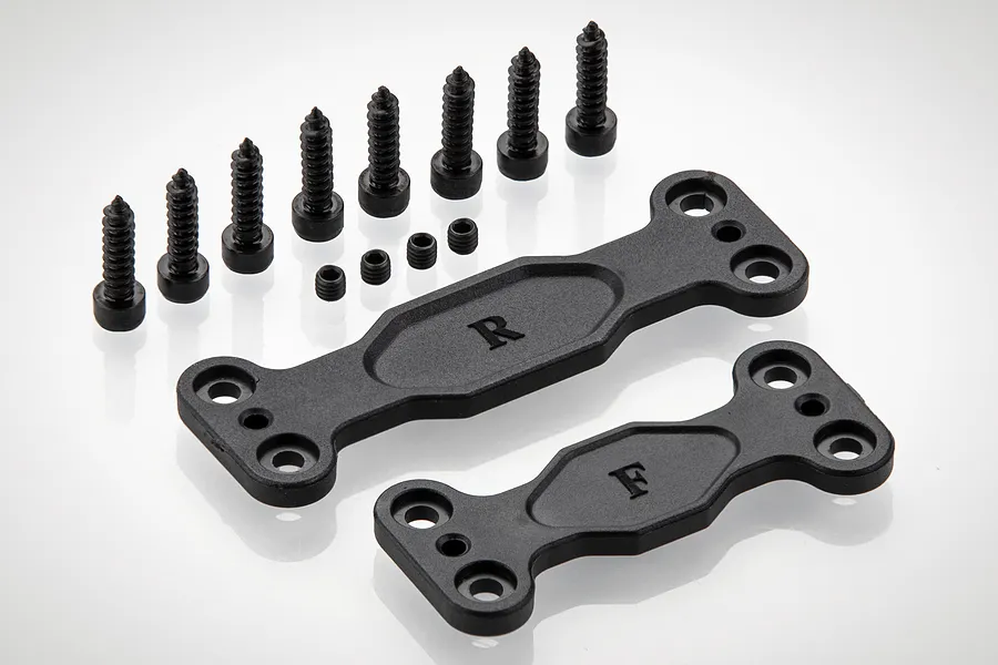 Rovan LT front and rear sway bar mounting plates with associated black screws and set screws on a white background.
