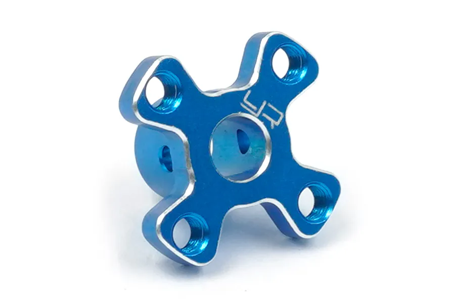 A blue anodized aluminium spur gear brace for Tamiya XV-02 RC cars, featuring a four-arm design with machined edges and the Yeah Racing logo.