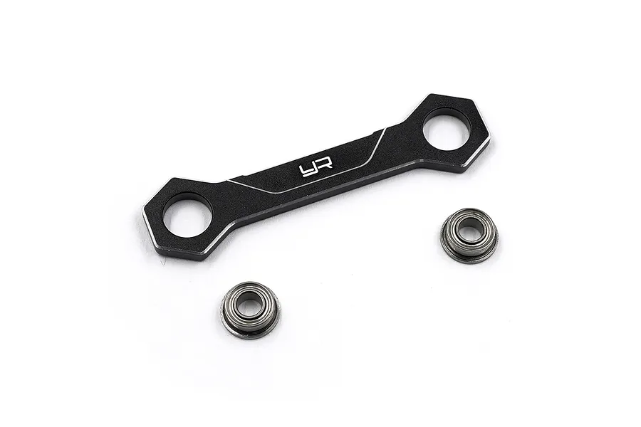A black aluminium steering brace by Yeah Racing with two ball bearings, isolated on a white background.