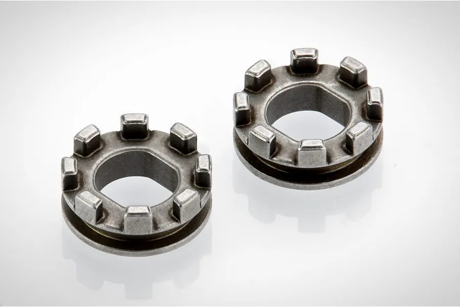 Two RGT differential locker components made of grey metal, shown from a top-down angle on a white background.
