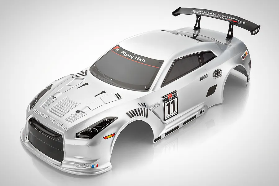 A silver HSP GTR RC car body shell with racing decals, a rear spoiler, and black window tinting, shown against a white background.