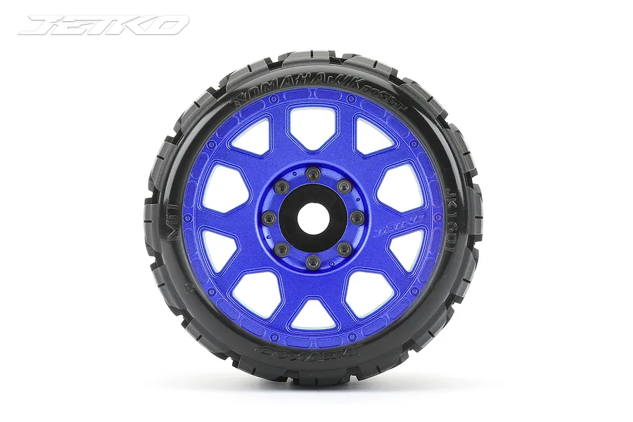 A single Jetko 3.6 inch Tomahawk SGT belted tire mounted on a blue multi-spoke wheel against a white background.