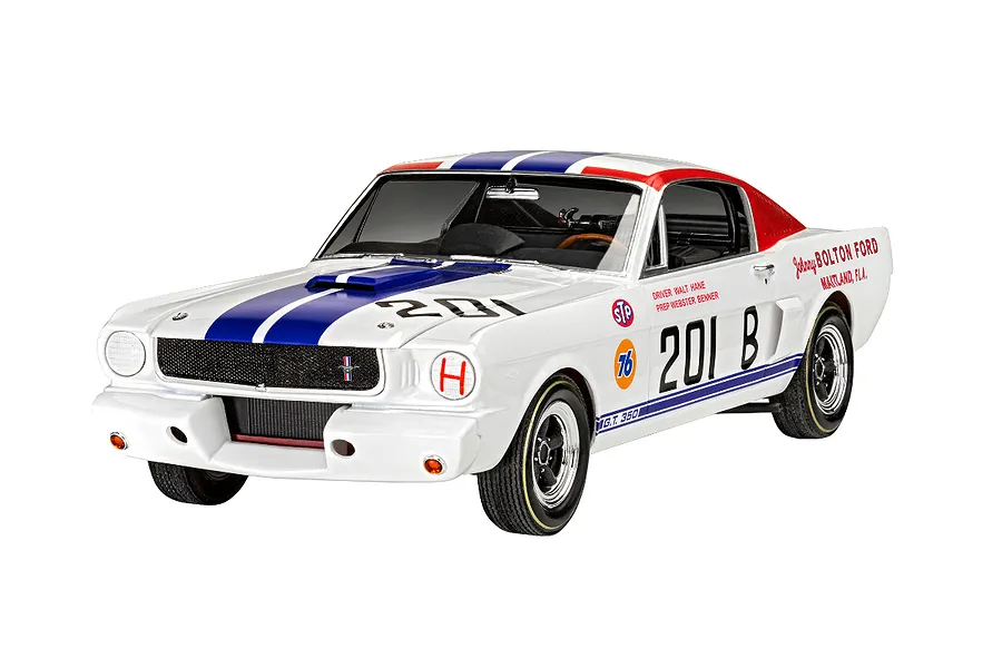 A studio shot of a 1/24 scale model of a white 1966 Shelby GT 350 R race car with blue and red racing stripes and number 201 decals.