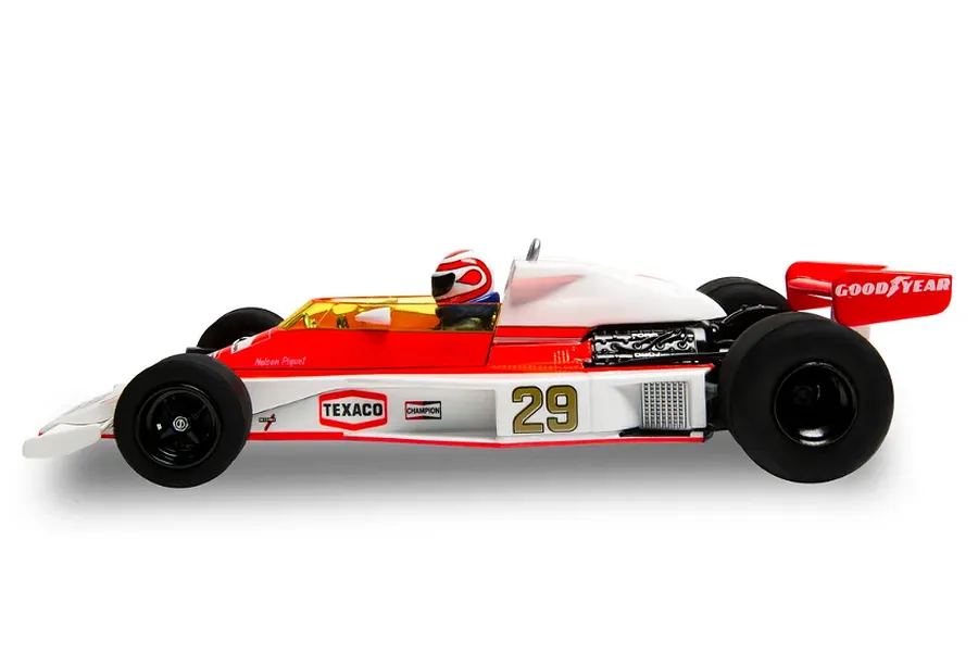 Side profile of a Scalextric 1/32 scale McLaren M23 slot car, number 29, in white and red livery with Goodyear and Texaco branding.