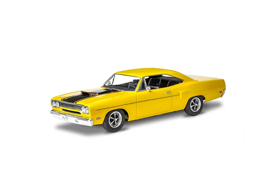 A fully assembled 1/24 scale model of a yellow 1970 Plymouth Roadrunner with black hood stripes, chrome bumpers, and detailed wheels.