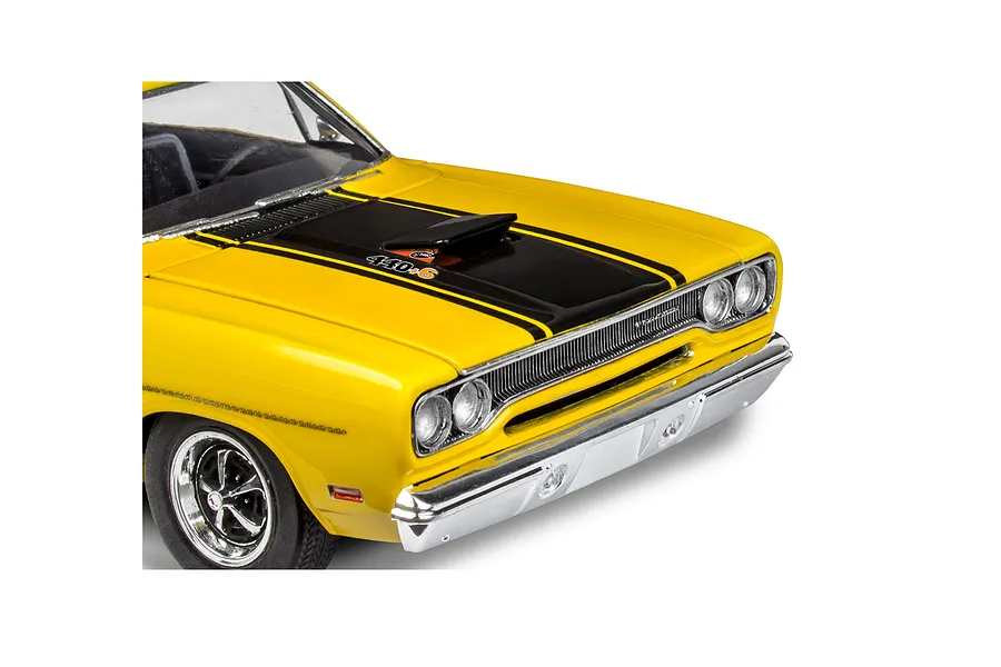 Close-up of a yellow 1970 Plymouth Roadrunner model car showing the front hood, grille, and chrome bumper.