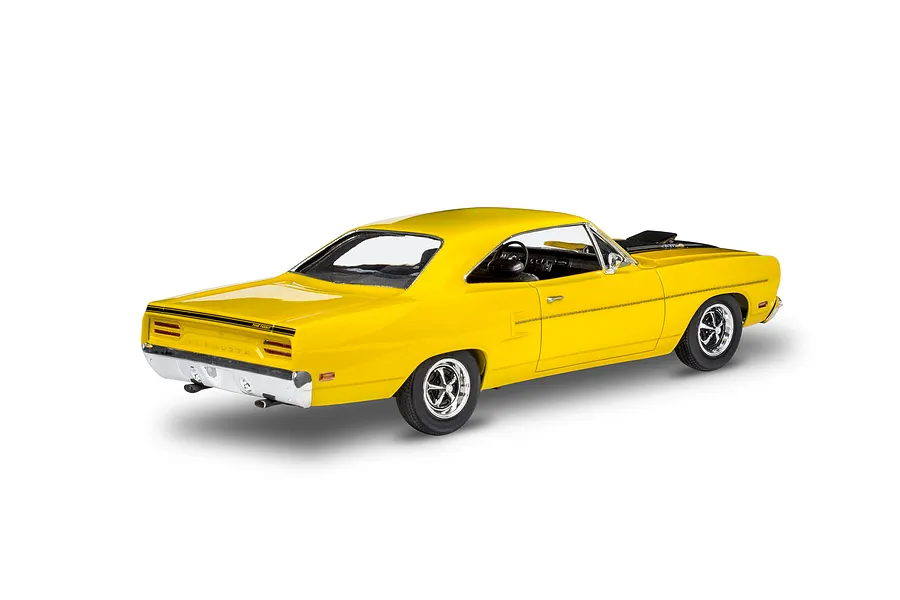 A rear three-quarter view of a yellow 1970 Plymouth Roadrunner scale model car on a white background.