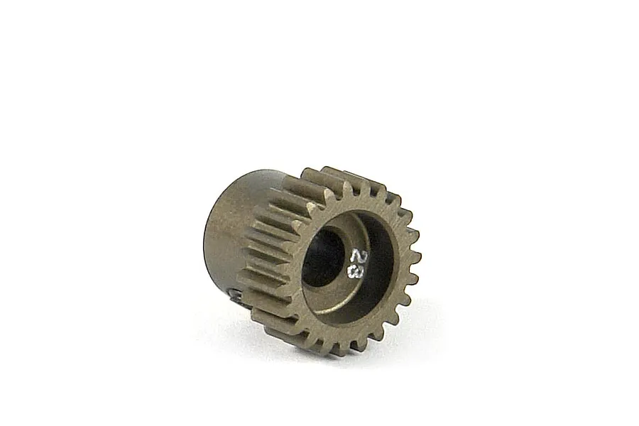 A bronze-coloured metal RC pinion gear with 23 teeth, showing the number 23 engraved on the face.