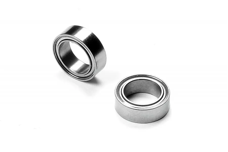 Two small metal shielded ball bearings shown from different angles on a white background.