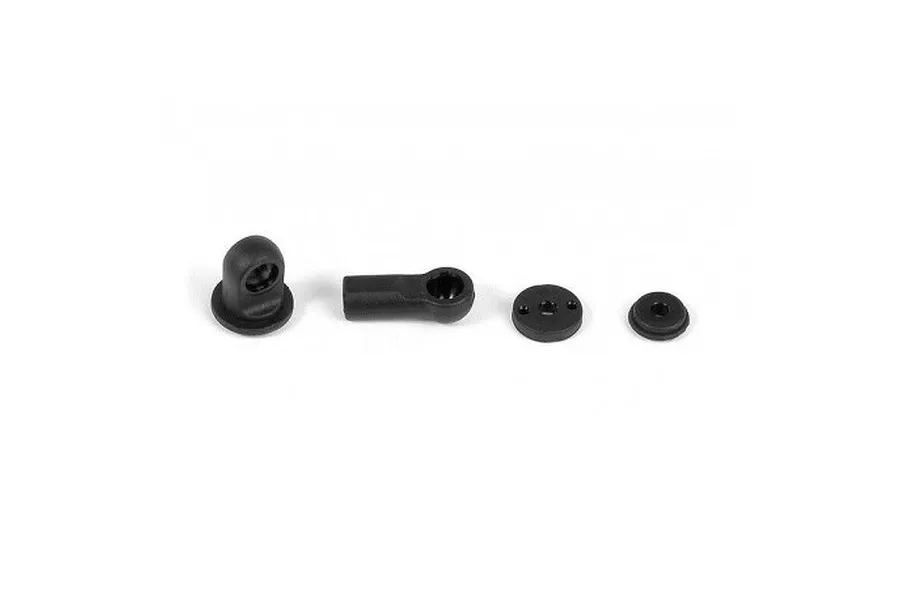 XRAY composite shock parts including a ball end, shock cap, and piston components on a white background.