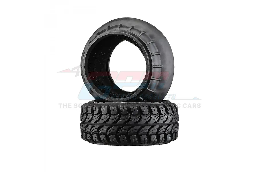 Two black rubber RC crawler tires stacked on a white background, featuring a detailed aggressive tread pattern.
