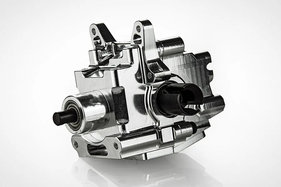 A silver Rovan aluminium front complete gearbox for an RC car, featuring a polished metal finish and black drive components.