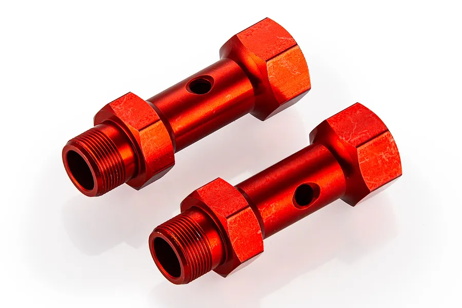Two red anodized aluminium front double axle extenders for RC cars on a white background.