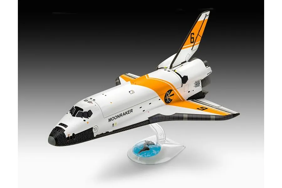 A finished model of the Moonraker space shuttle from the James Bond film, mounted on a clear display stand with a globe base.