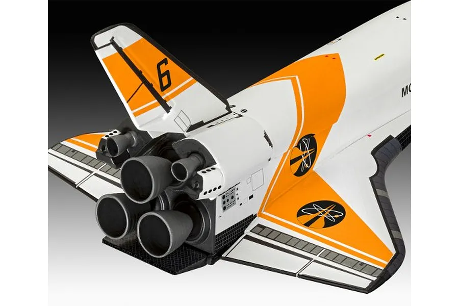 A close-up view of the rear section of a Moonraker space shuttle model, showing the engine nozzles, tail fin with the number 6, and orange and white markings.