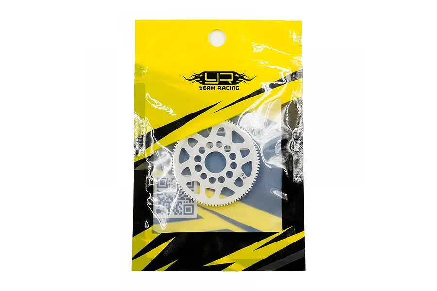 Yeah Racing 94T 64dp Delrin spur gear sealed in branded yellow and black plastic retail packaging.