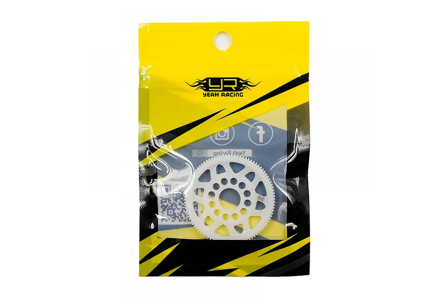 A white Delrin 96T 64dp spur gear inside a yellow and black Yeah Racing branded plastic retail bag.