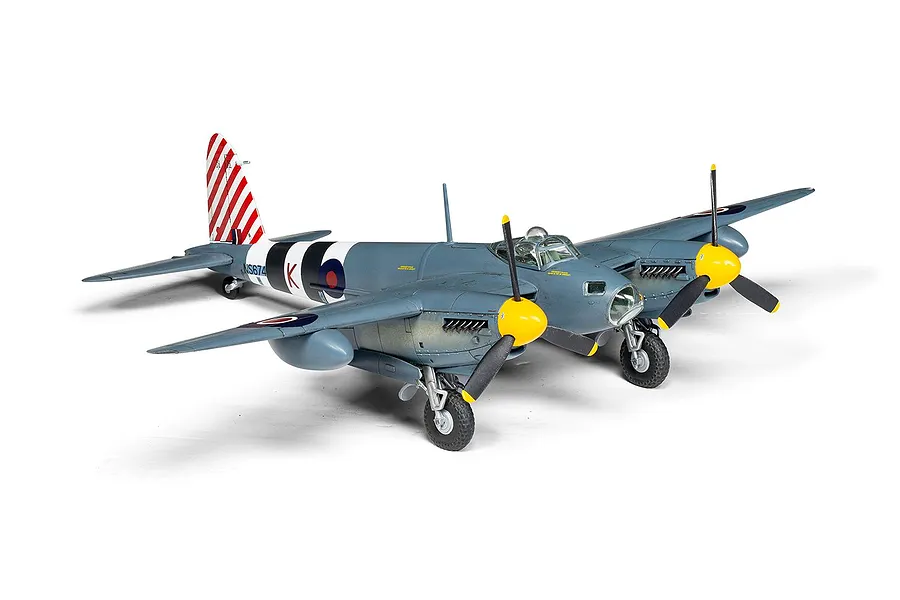 A fully assembled and painted 1/72 scale plastic model of a de Havilland Mosquito aircraft, featuring blue-grey camouflage and red-and-white striped tail.