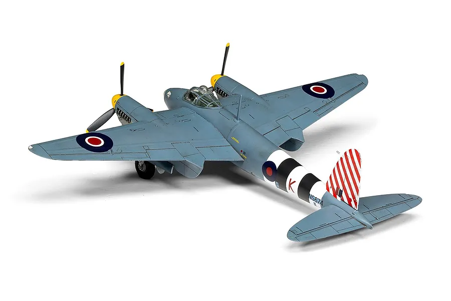 A completed and painted 1/72 scale plastic model of a de Havilland Mosquito aircraft, viewed from the rear three-quarter angle against a white background.