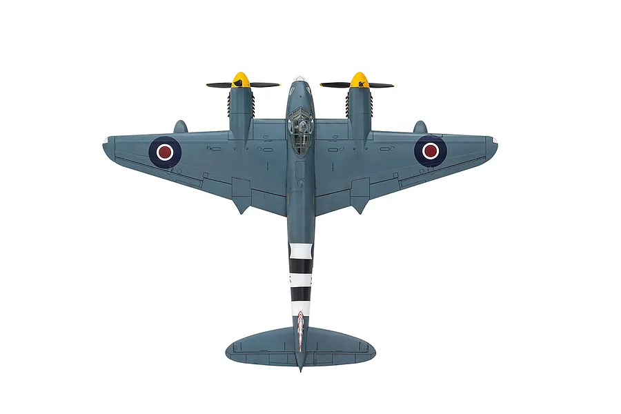 Top-down view of a finished 1/72 scale de Havilland Mosquito model aircraft, painted in grey with invasion stripes and RAF roundels.