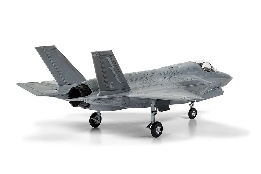 A rear three-quarter view of a fully assembled and painted 1/72 scale Lockheed Martin F-35B Lightning II plastic model aircraft on a white background.