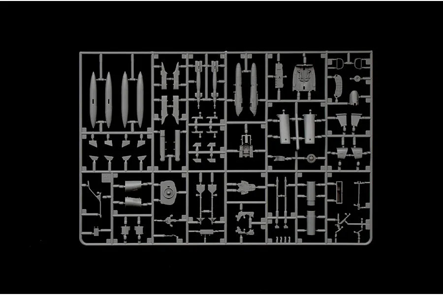 A grey plastic sprue containing various model aircraft parts for an Italeri 1/72 AMX Ghibli kit, set against a solid black background.