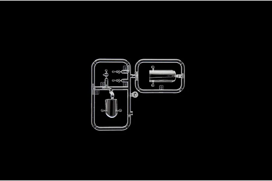 A clear plastic sprue containing small model aircraft canopy and cockpit parts for an Italeri 1/72 scale model kit.
