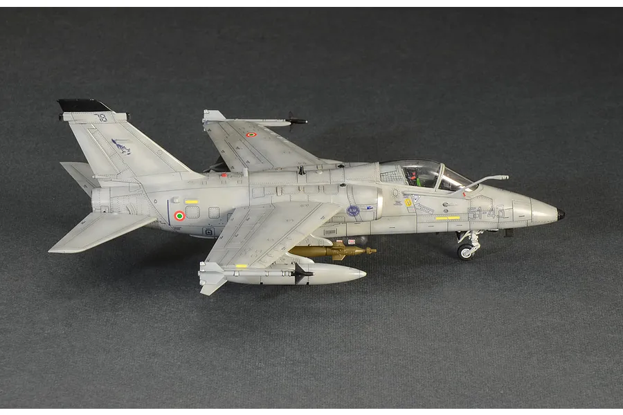 A side-profile view of a fully assembled and painted 1/72 scale Italeri AMX Ghibli attack aircraft model kit on a dark grey background.