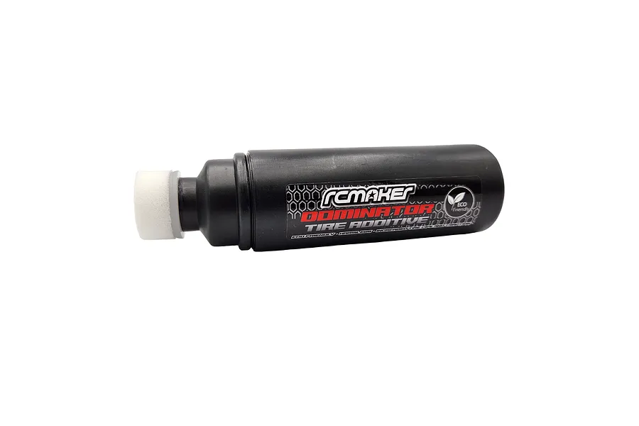 A black plastic bottle of RC Maker Dominator Asphalt Tire Additive with a white foam applicator tip on a white background.