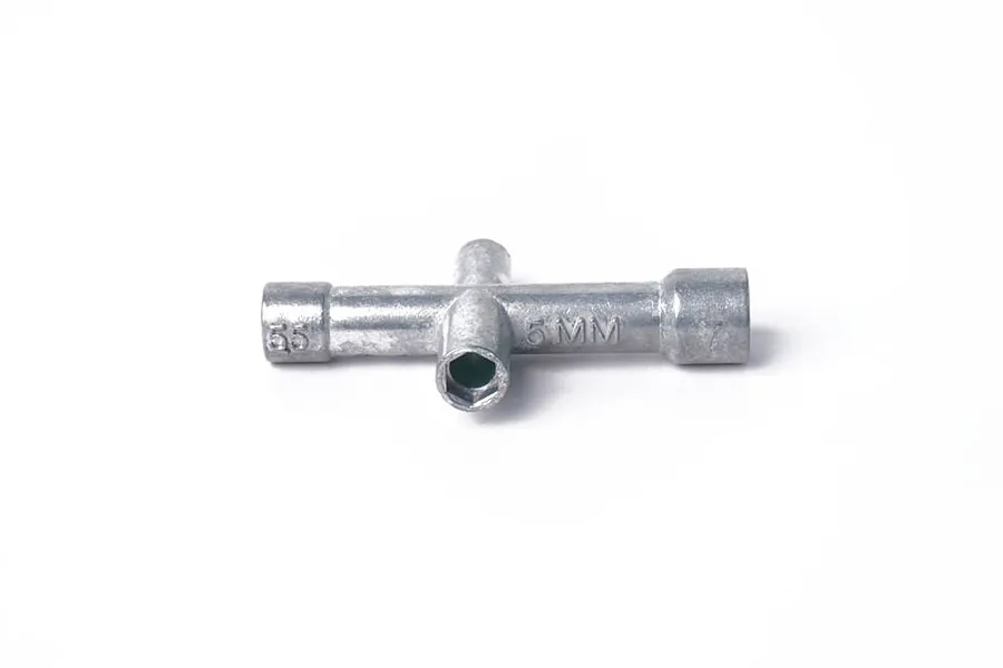 A silver-coloured metal cross wrench tool for RC models, featuring four different socket sizes and embossed size markings on a plain white background.
