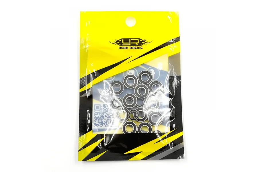 A sealed plastic retail bag containing a set of small metal ball bearings from Yeah Racing, featuring a yellow and black branded header.