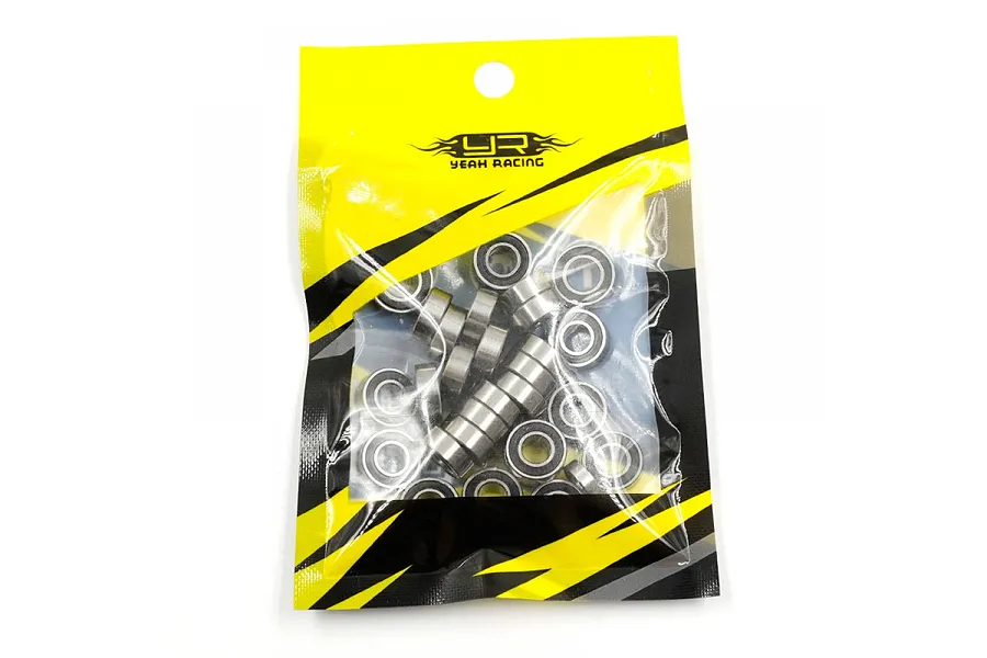 A sealed plastic retail bag containing a collection of small metal ball bearings from Yeah Racing.
