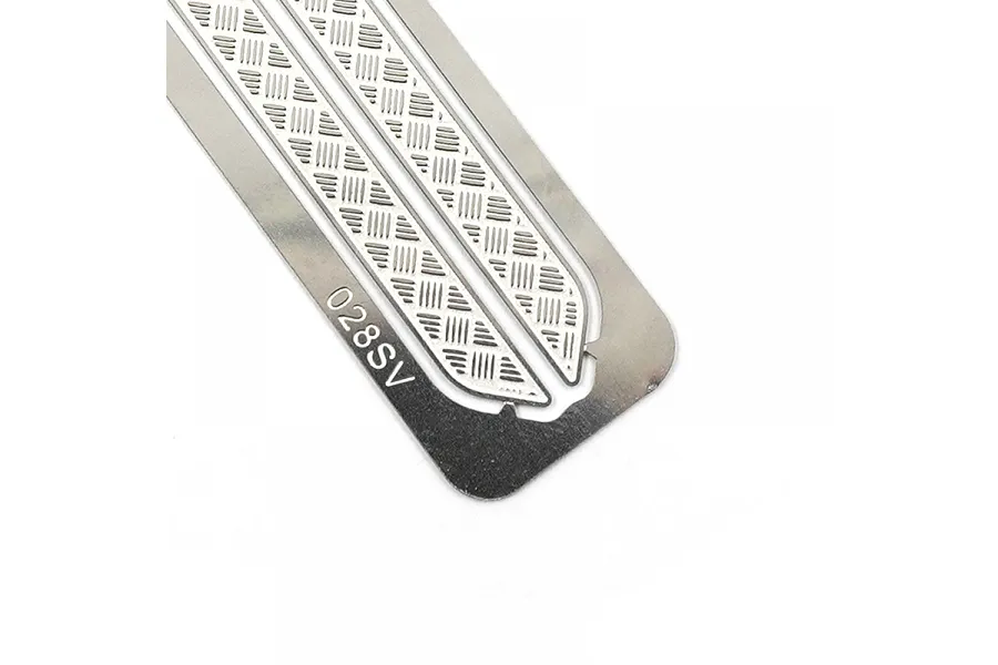 A close-up of two silver stainless steel diamond plate rock rails for an RC car, featuring a textured tread pattern and the model number 028SV etched on the metal.