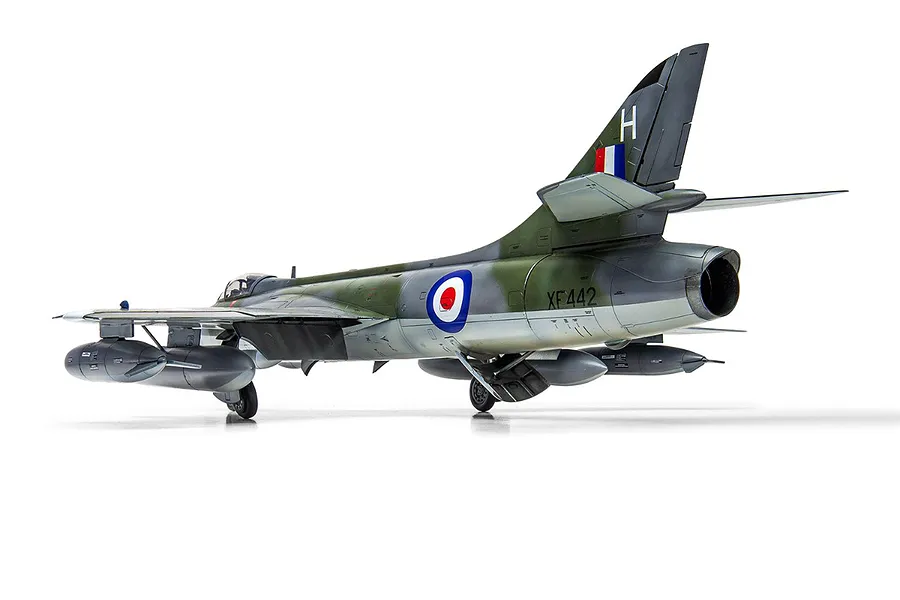 A completed 1/48 scale plastic model of a Hawker Hunter fighter jet, viewed from the rear three-quarter angle against a white background.
