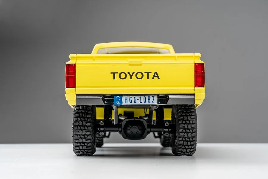 FMS 1983 Toyota Hilux RC Rock Crawler Electric 4WD 1/18 Scale RTR - Yellow image 83745