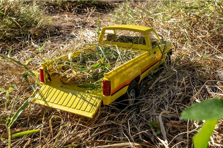 FMS 1983 Toyota Hilux RC Rock Crawler Electric 4WD 1/18 Scale RTR - Yellow image 83750